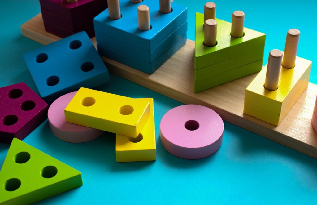 Colorful shape sorting educational toy for kids learning shapes and problem solving